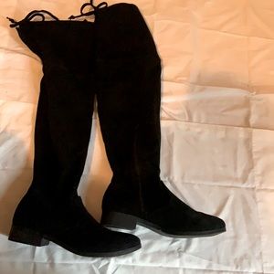 Long knee-high black boots